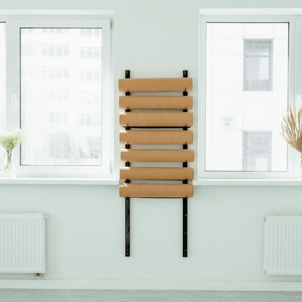 Bright and airy yoga studio with large windows.